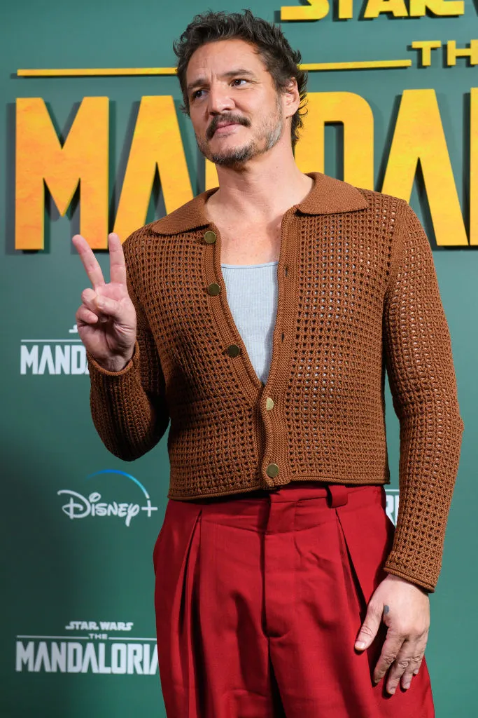 Pedro Pascal's London Wardrobe: Red Pants and a Crocheted Sweater